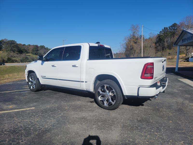 The same white pickup after rear body repair and refinishing